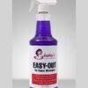 Easy-Out Waterless Stain and Odor Remover bottle in front of a clean-coated horse
